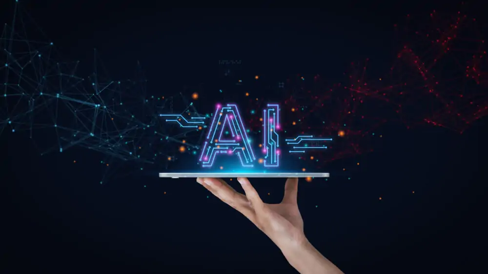 Sigla de AI em cima de um tablet representando como usar a inteligência artificial no dia a dia